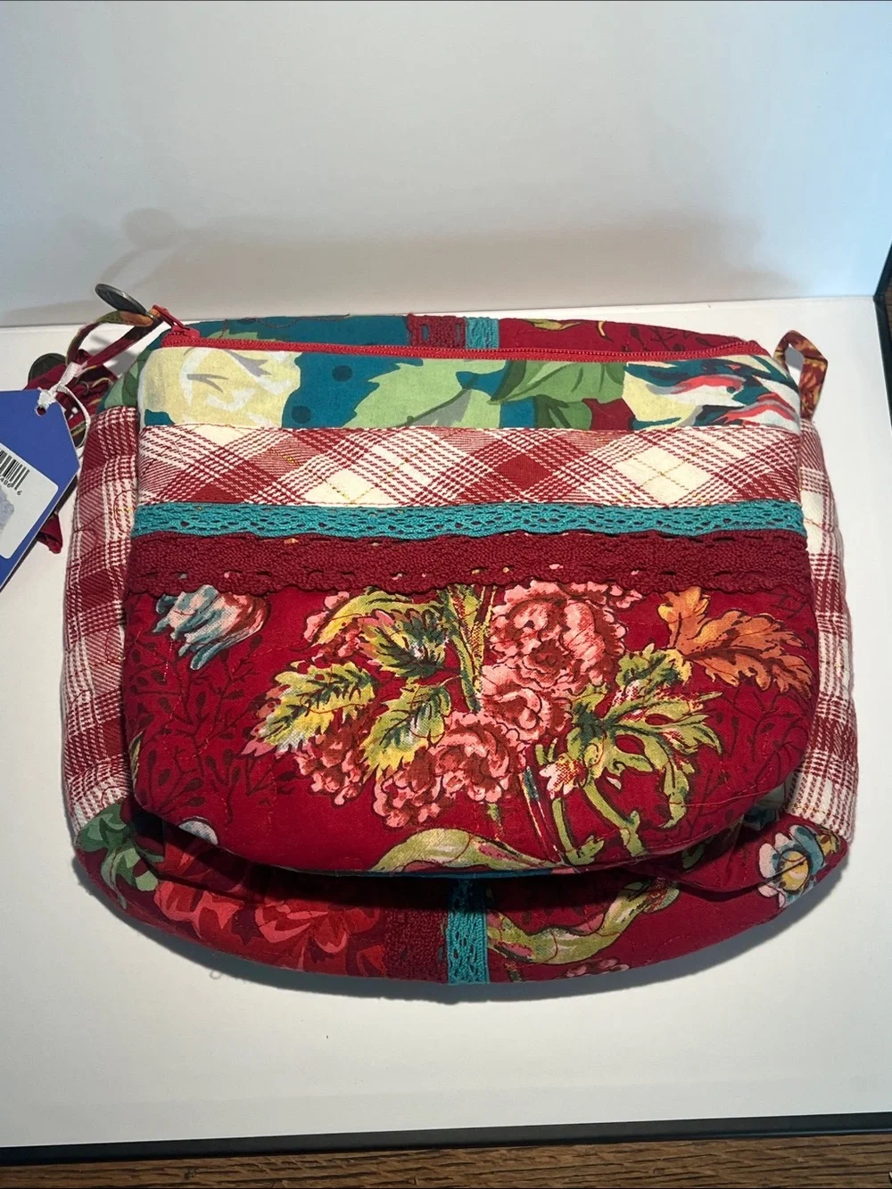 April Cornell Red Floral Quilted Cosmetic Crossbody with Teal Accents